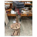 Red and black benchtop drill press cast-iron