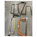 Vintage  and modern frame-style hand saws