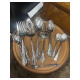 Collection of vintage silver-plated flatware and