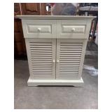 White wood-paneled shutter cabinet from Pier 1