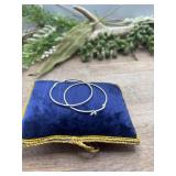 .925 sterling silver round hoop earrings feature