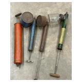Vintage manual hand-pump sprayers and foggers.