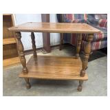 Vintage two-tier oak end table.