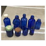 Vintage colt blue glass bottles and jars