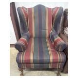 Traditional wingback accent chair upholstered in