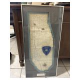 Framed shadowbox features a vintage paper map of