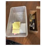 Wooden box contains an assortment of vintage