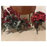 Festive flower arrangement features vibrant red