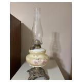 Vintage kerosene oil lamp featuring a