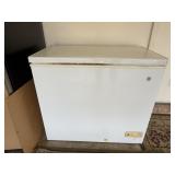 Small GE chest style freezer. Does work. Contents