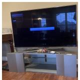 Samsung smart tv on a gray Mitsubishi DLP