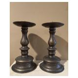Antique-style bronze pillar candle holders.