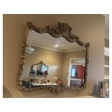 Ornate Baroque-style wall mirror.