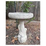 Concrete garden bird bath.