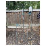 Green metal arched garden trellis.