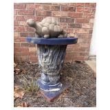 Unique weathered blue and gray concrete pedestal
