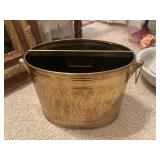 Vintage oval hammered brass magazine and