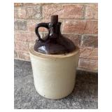 Vintage two-tone stoneware whiskey jug.