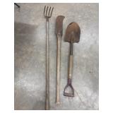 Vintage garden and farm tools with wooden handles