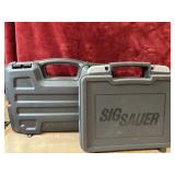 2 pc. Sig Sauer hard plastic pistol case and