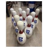 Set of 10 Brunswick Max bowling pins arranged in