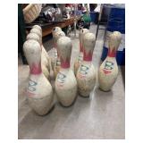 Set 10 of vintage Brunswick bowling pins.