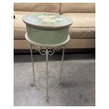 Vintage-style green accent table featuring a drum