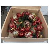 Festive red and gold Christmas wreath packed with