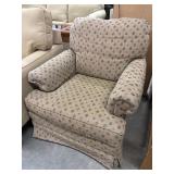 Vintage-style skirted club chair.