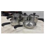 Vintage Revere Ware stainless steel pots and
