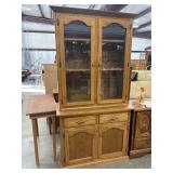 Traditional 2-piece oak china hutch.