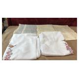 4 pc. Runners and pillow cases.