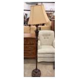 Traditional vintage-style swing-arm floor lamp.