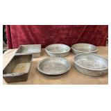 6 pc. Metal cake pans and loaf pan. Used.