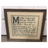 Framed, handmade cross-stitch wall art piece