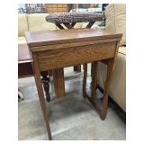 Vintage oak drop-leaf sewing machine table.