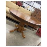 Vintage round oak pedestal dining table.