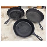 2 Cast-iron skillets unmarked, 1 cast iron