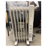 Portable Holmes Rolling Oil Filled Radiator space