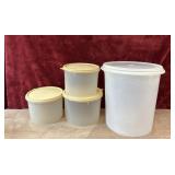 4 pc. Tipper plastic storage containers.