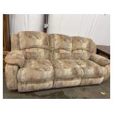 Vintage multi-seat reclining sofa.