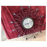 Welby starburst wall clock. Needs batteries.