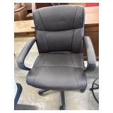 Brown mid-back faux leather office task chair.