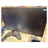 Acer computer monitor attached to an adjustable