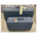 2 pc. American Tourister hard-shell suitcase.