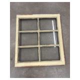 Vintage six-pane wooden window sash.
