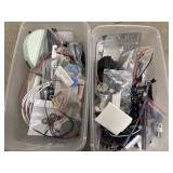 2 Storage bins filled with a collection of DIY