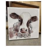 Watercolor-style canvas print of a cow wearing a