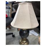 Vintage-style table lamp features a striking dark