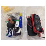 Red digital multimeter inside a clear plastic